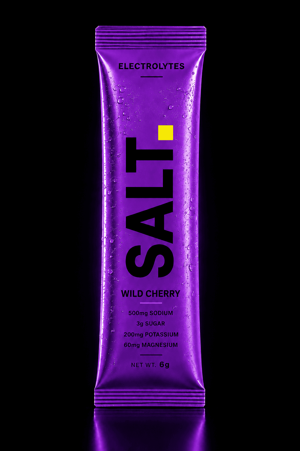 SALT Wild Cherry sachet — vivid purple pack on a dark stage, 500mg sodium, 3g sugar per serve.